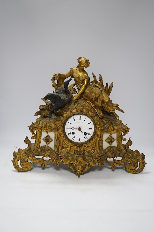 A Louis XV style gilt bronze mantel clock, 41cm wide, 35cm high. Condition - one replacement foot, fair but very dusty, not tested as working